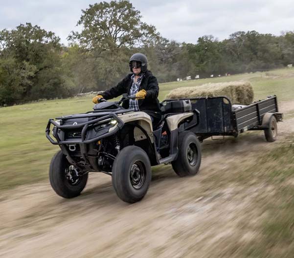 ATV racing along a moutainous road